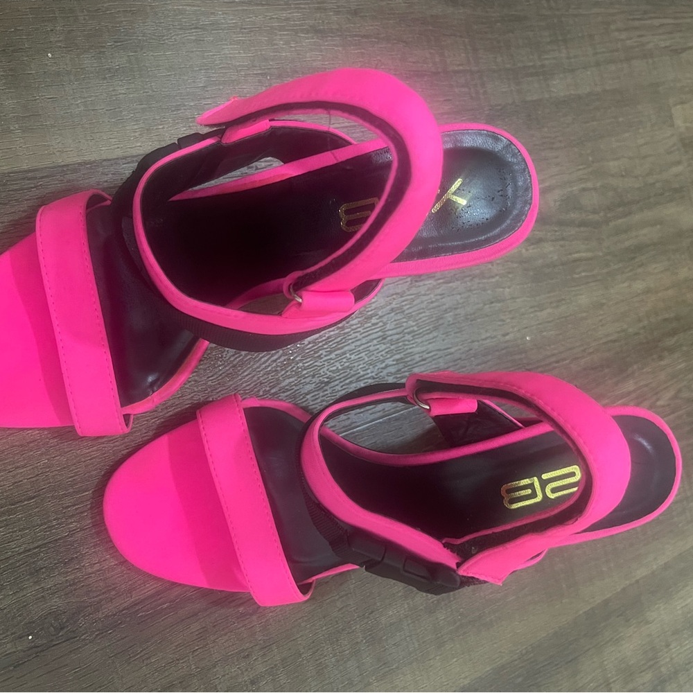 Hot pink and black heels, open toes